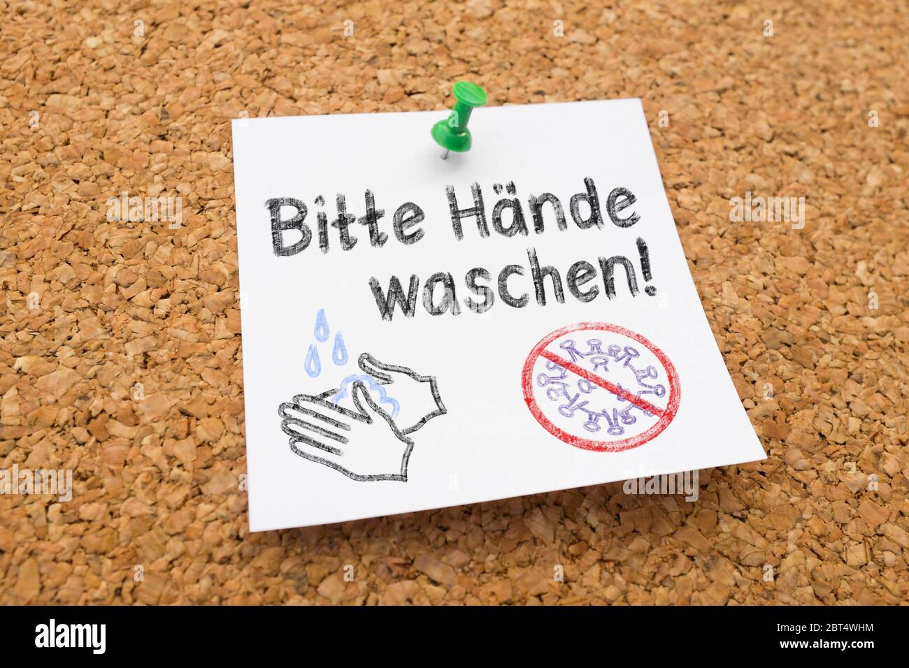 Pinnwandzettel 'Bitte Hände Waschen' gegen Ausbreitung des Virus Stock Photo