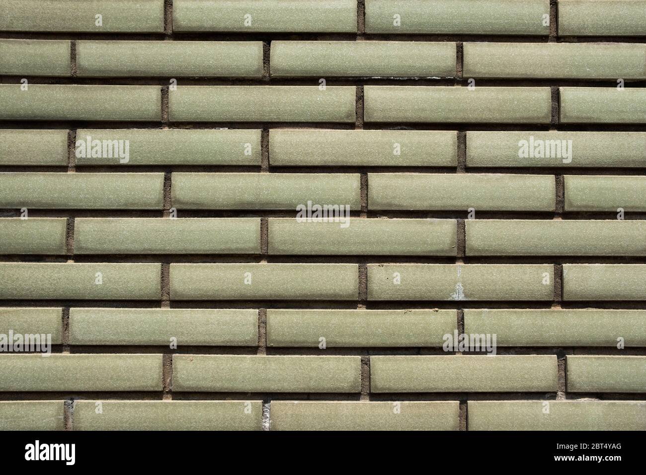 Khaki green tile wall texture background Stock Photo