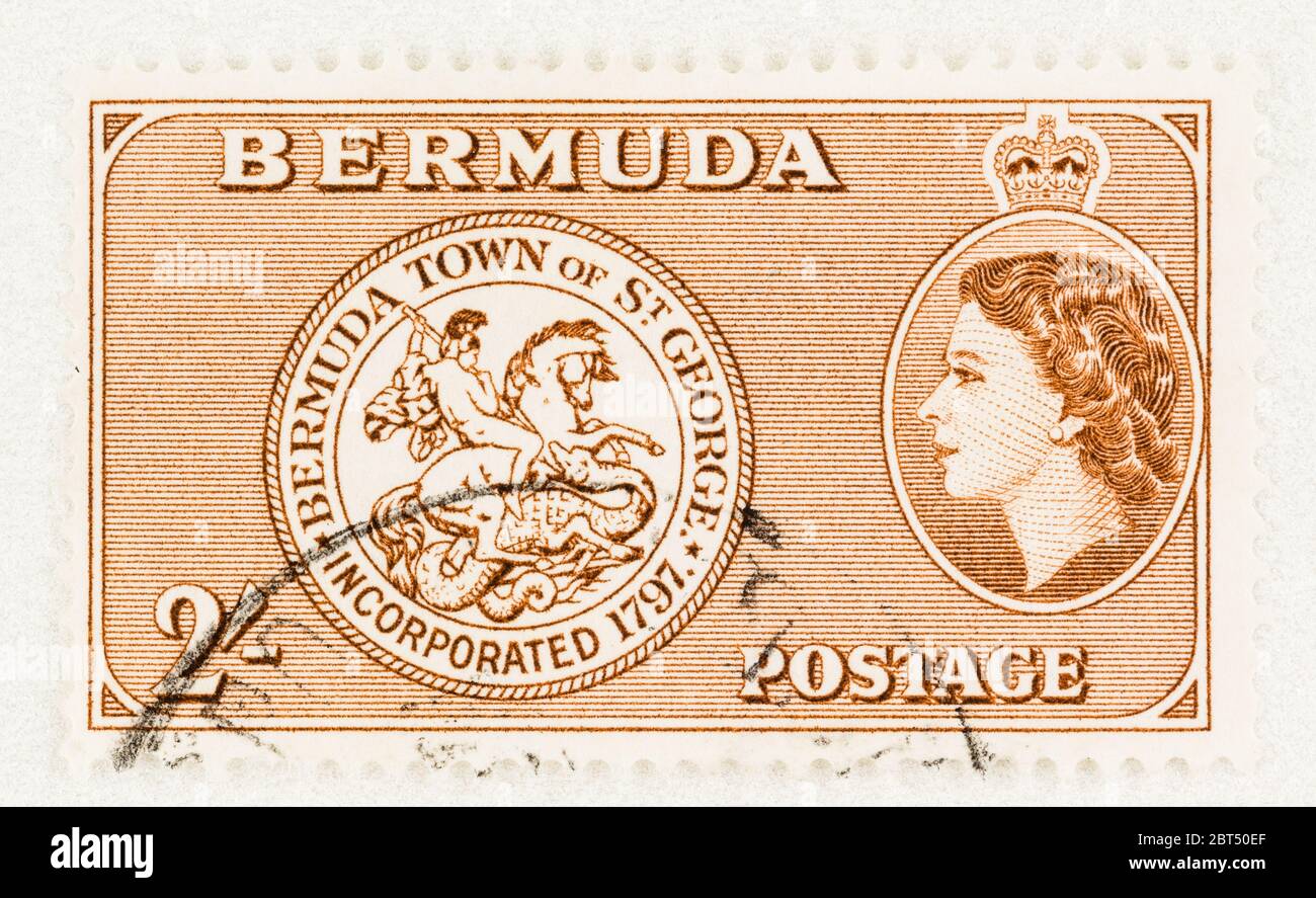 SEATTLE WASHINGTON - May 2, 2020: Bermuda postage stamp of 1953 with Coat of Arms of St George and Queen Elizabeth II. Scott # 158 Stock Photo