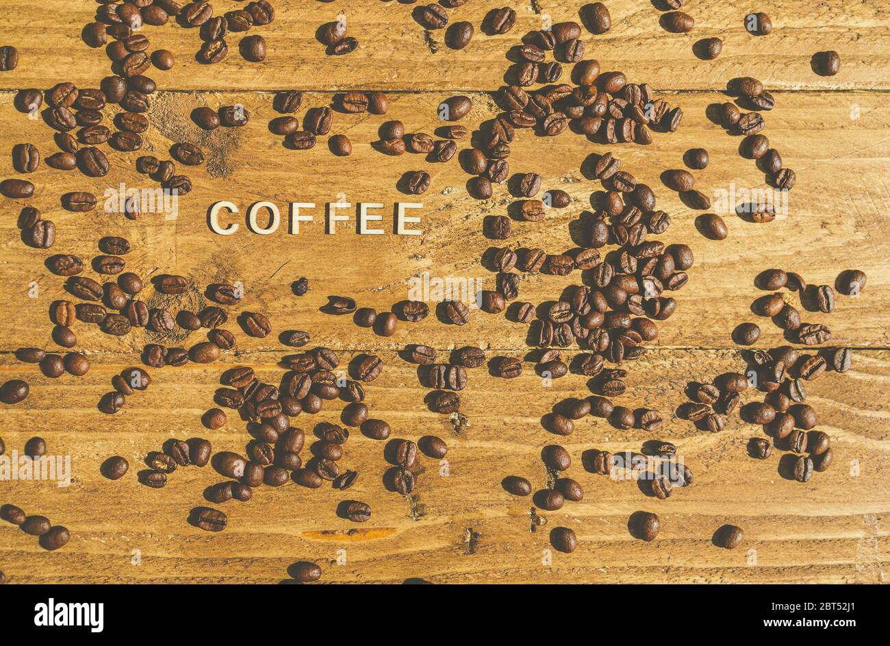 Roasted coffee beans with the word coffee Stock Photo