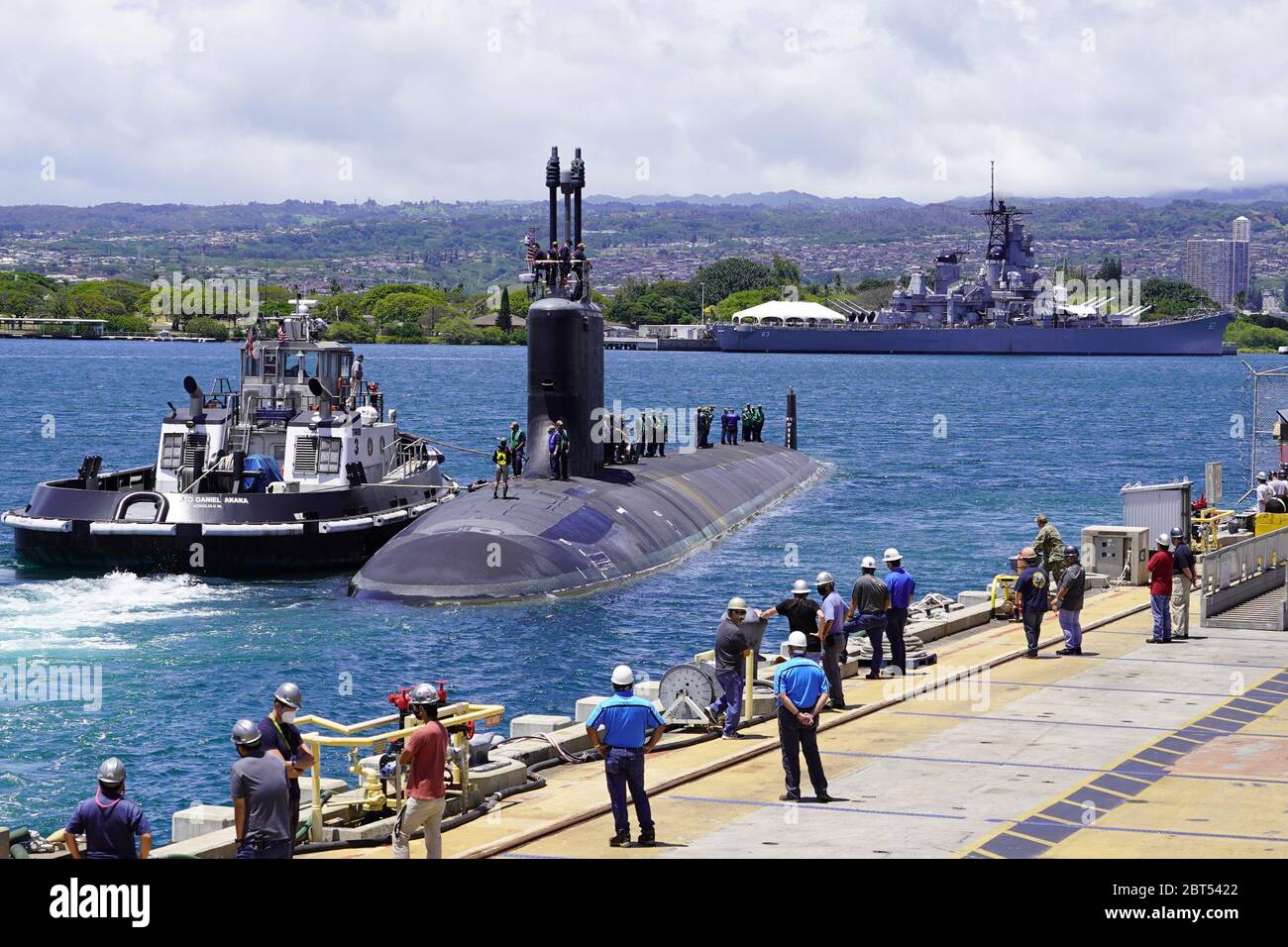 PEARL HARBOR, Hawaii (May 10, 2020) – USS Missouri (SSN 780), a Virginia-class fast-attack submarine, departs Pearl Harbor Naval Shipyard and Intermediate Maintenance Facility piers to begin sea trials on May 10. Missouri's routine maintenance and modernization work was completed five days ahead of schedule after successful sea trials and certification. The submarine's recent availability required 2.2 million work-hours to complete more than 20,000 jobs that will ensure the ship remains fully operational for its planned 33-year service life. Stock Photo