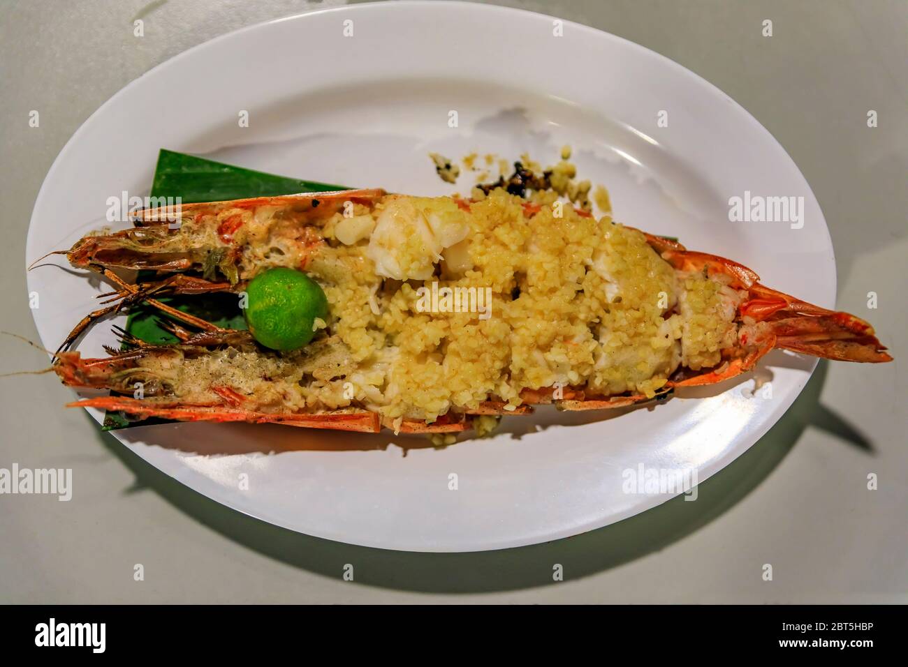 Fresh large prawn or tiger shrimp grilled with roasted garlic and lime