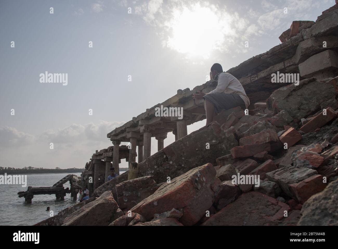 Jharkhali, India. 22nd May, 2020. The main bridge of jetty of the jetty ghat of Sunderbans got broken in super cyclone Amphan. (Photo by Jit Chattopadhyay/Pacific Press) Credit: Pacific Press Agency/Alamy Live News Stock Photo