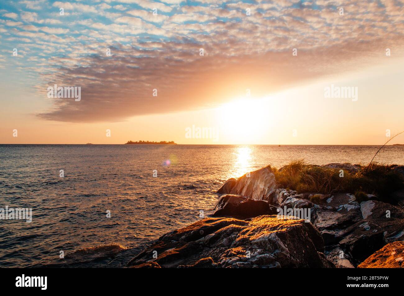 A breathless capture of the golden hour in Colonia Del Sacramento, Uruguay with a view to Rio De La Plata. Stock Photo