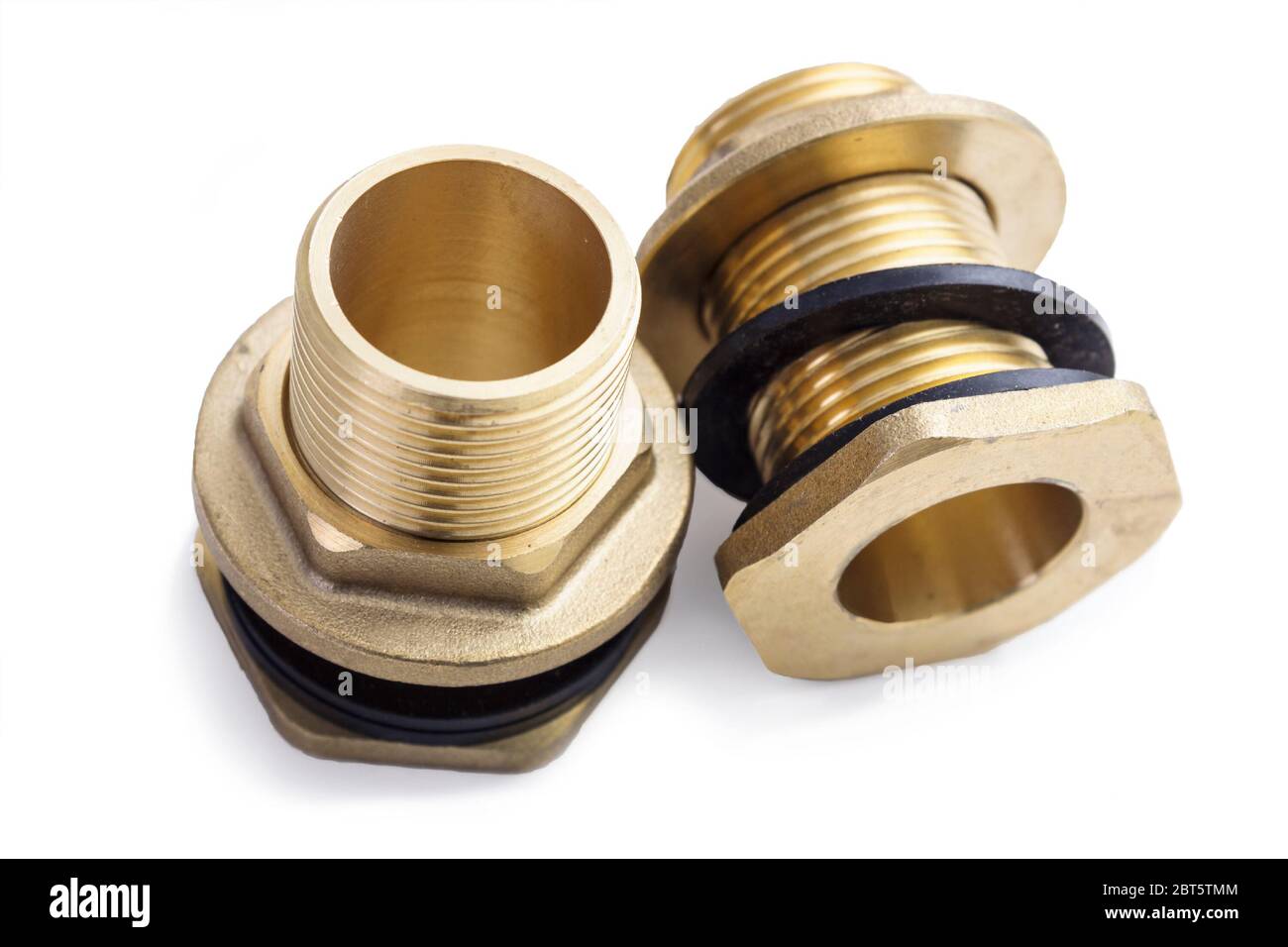 Two brass fittings with rubber washers on white background Stock Photo