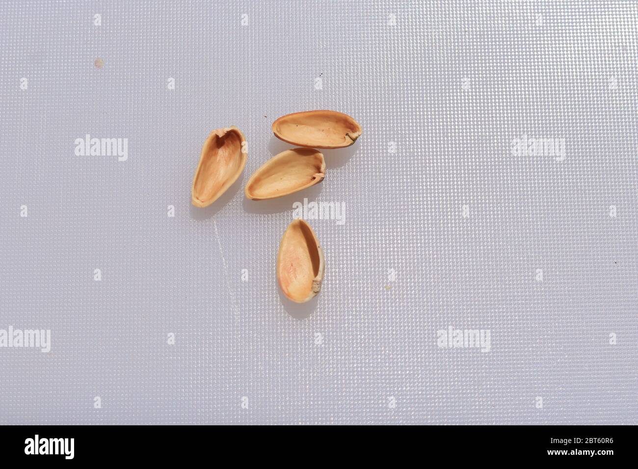 Pistachios shells isolated on white background Stock Photo