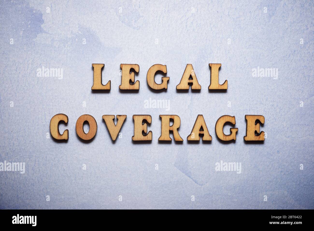 Legal coverage text in a colored paper Stock Photo - Alamy