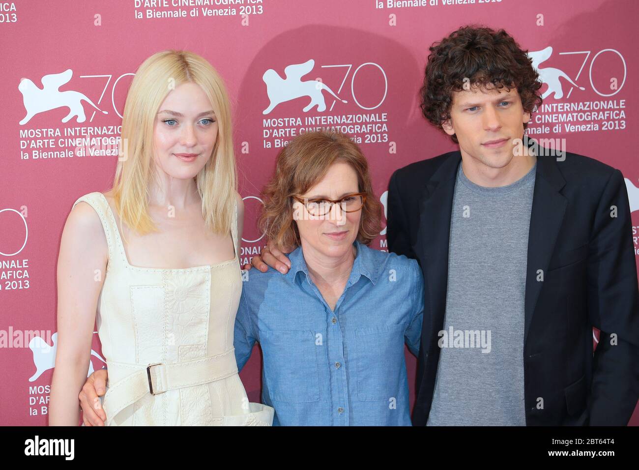 VENICE, ITALY - AUGUST 31: Dakota Fanning, Kelly Reichardt and Jesse Eisenberg attends 'Night Moves' Photocall during the 70th Venice Film Festival Stock Photo