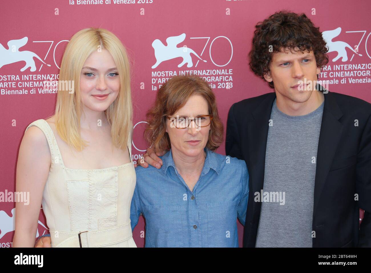 VENICE, ITALY - AUGUST 31: Dakota Fanning, Kelly Reichardt and Jesse Eisenberg attends 'Night Moves' Photocall during the 70th Venice Film Festival Stock Photo