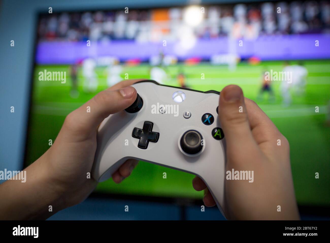 Debrecen, Hungary, 19. November 2017 View from the top on xbox one s  gamepad, game console, kid holding in his hands Stock Photo - Alamy