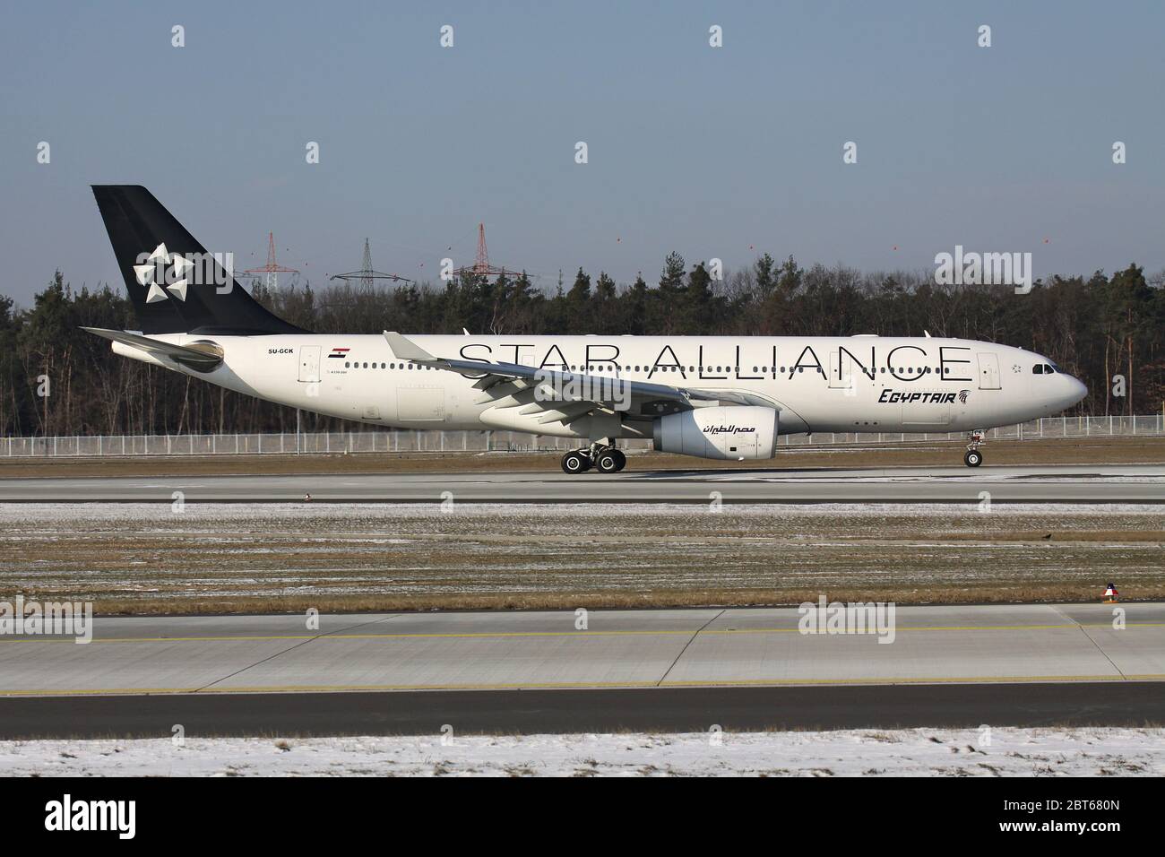 EgyptAir Airbus A 330-200 in special Star Alliance livery with registration SU-GCK just landed on runway 07L of of Frankfurt Airport. Stock Photo