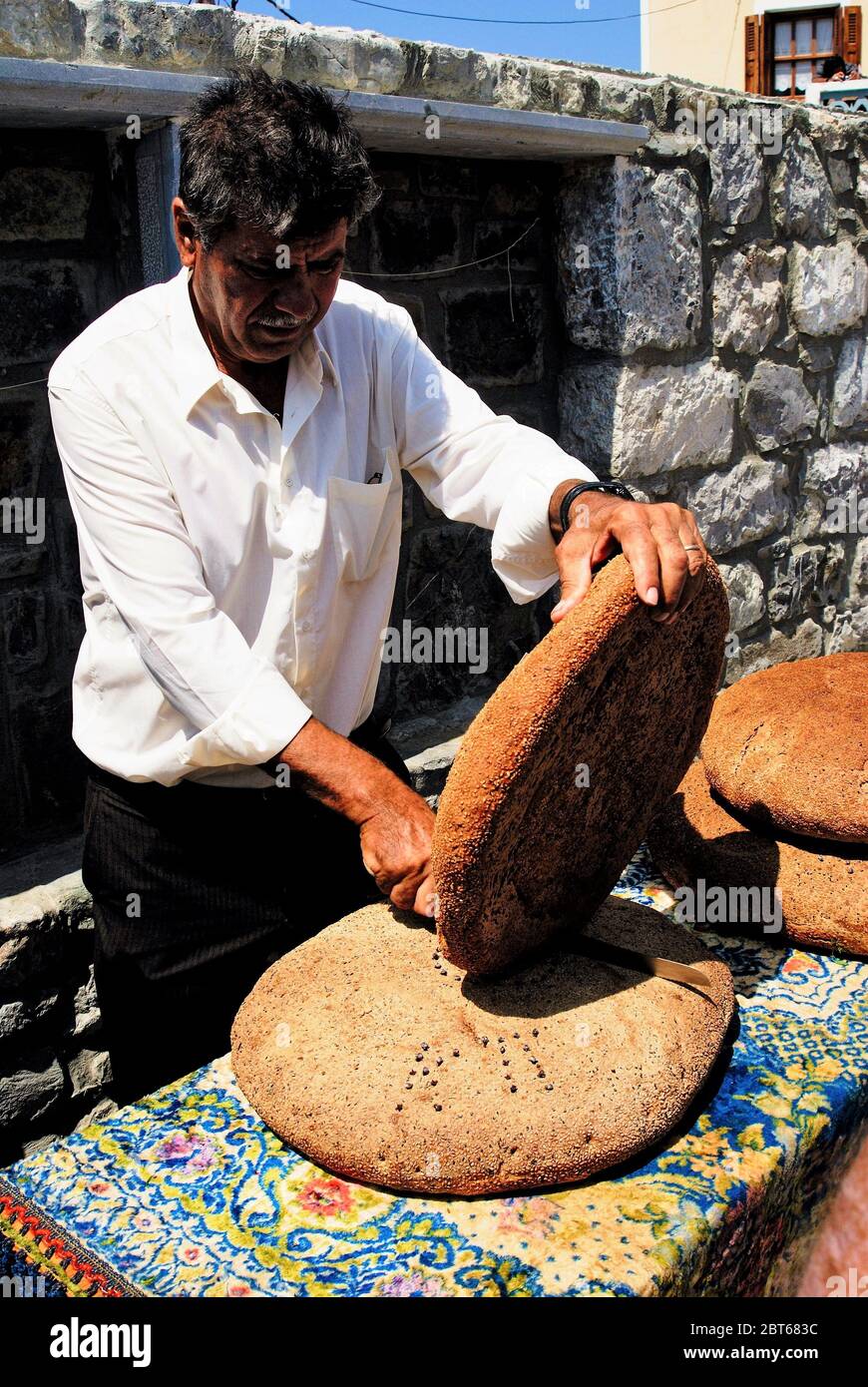 Fresh traditionally baked bread at Olympos village, Karpathos island, Greece, August 15 2008. Stock Photo