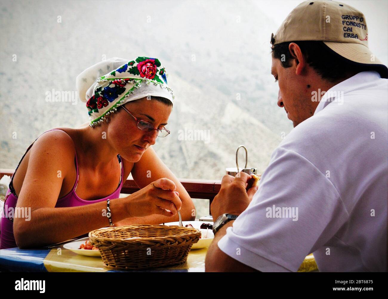 Greece, Karpathos island, Olympos village, August 14 2008 - Tourist wearing a traditional veil of Olympos. Stock Photo
