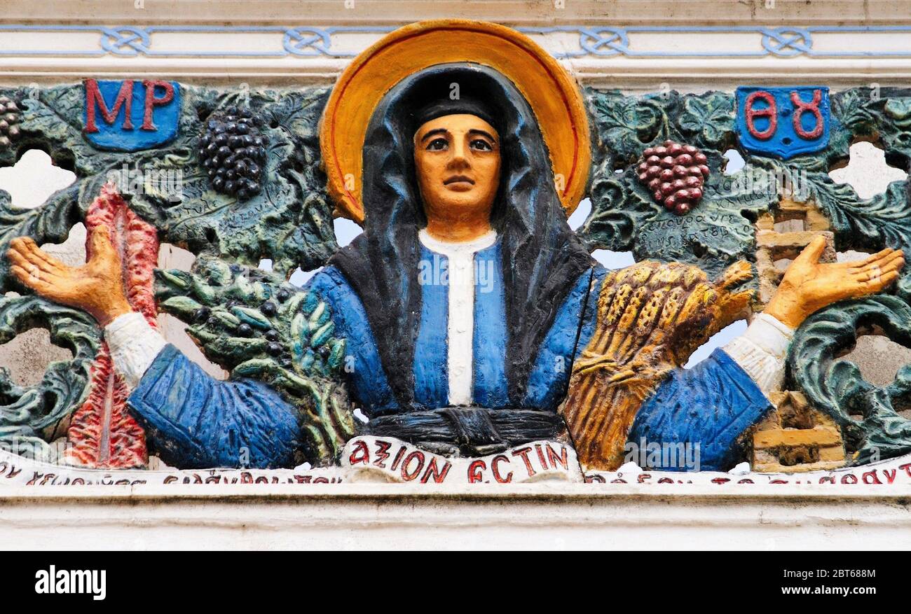 Virgin Mary carved on wood, detail from church in Olympos village, Karpathos island, Greece, August 14 2008. Stock Photo