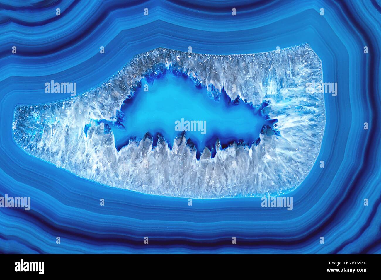 Decorative agate slab. Blue semi-precious stone. Abstract background