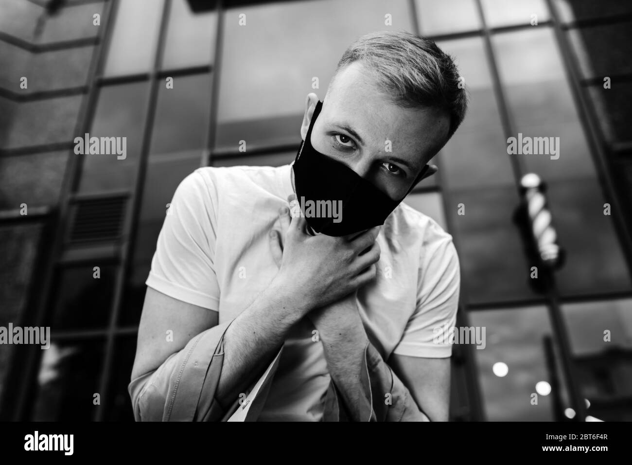 Black and white portrait of a man in a mask against the virus Stock ...