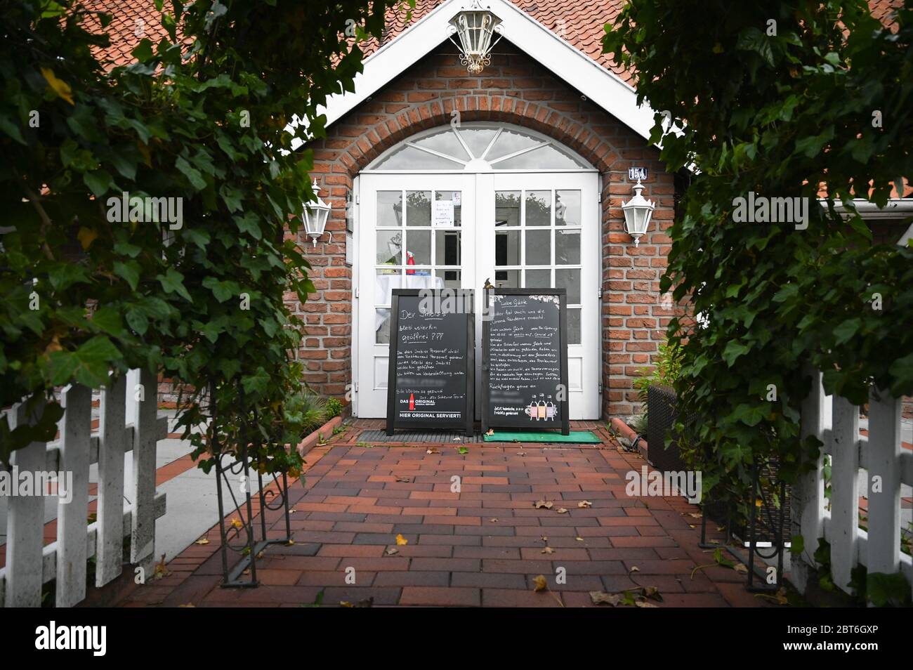 Leer, Germany. 23rd May, 2020. There are signs in front of the restaurant "Alte Scheune". After visiting the restaurant in the district of Leer, several people tested positive for the corona virus. Credit: Lars-Josef Klemmer/dpa - ATTENTION: Contact data pixelated for legal reasons/dpa/17�Թ����� Live News Stock Photo