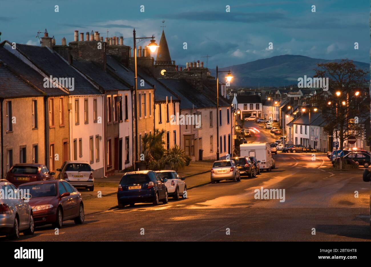 Goerge Street Whithorn at dusk wih street lighting, Machars of Wigtownshire Stock Photo