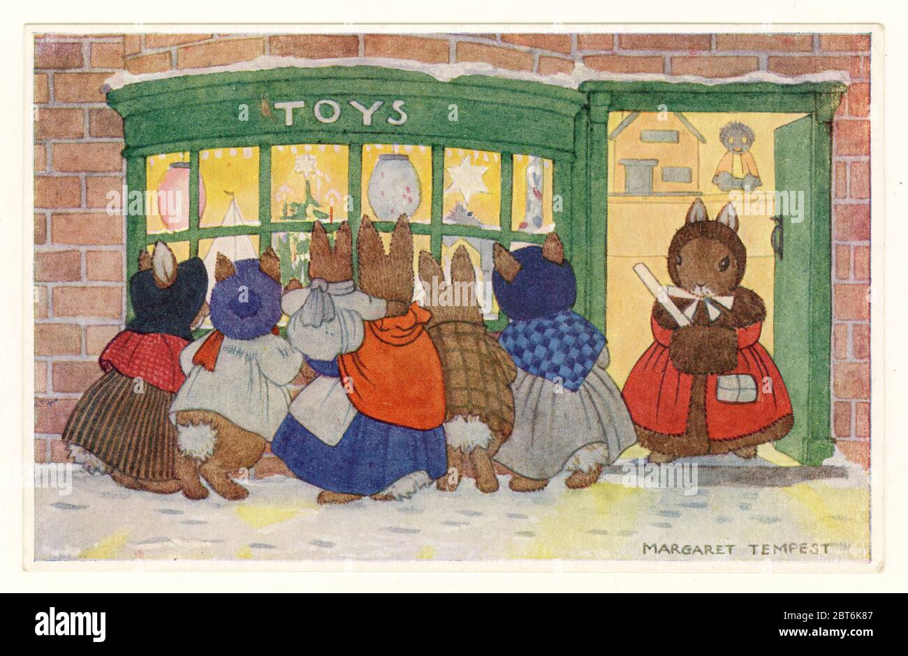 Original greetings postcard illustration of rabbits in clothes looking in at the toy shop window, "The Toy Shop", U.K., circa 1940's Stock Photo