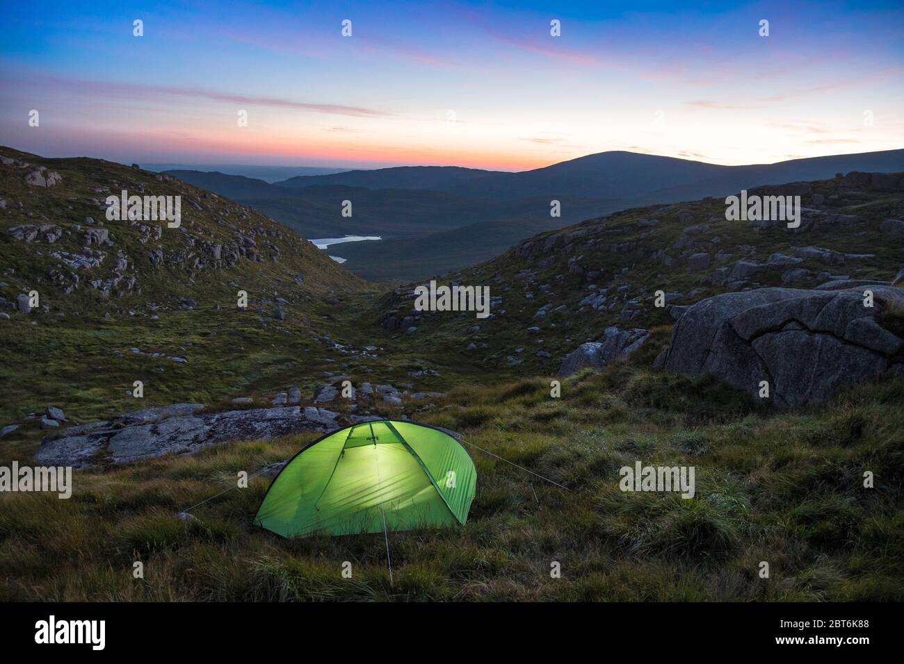 Lone camper in one man tent by Devil's Bowling Green, Craignaw, Galloway Forest Park Stock Photo