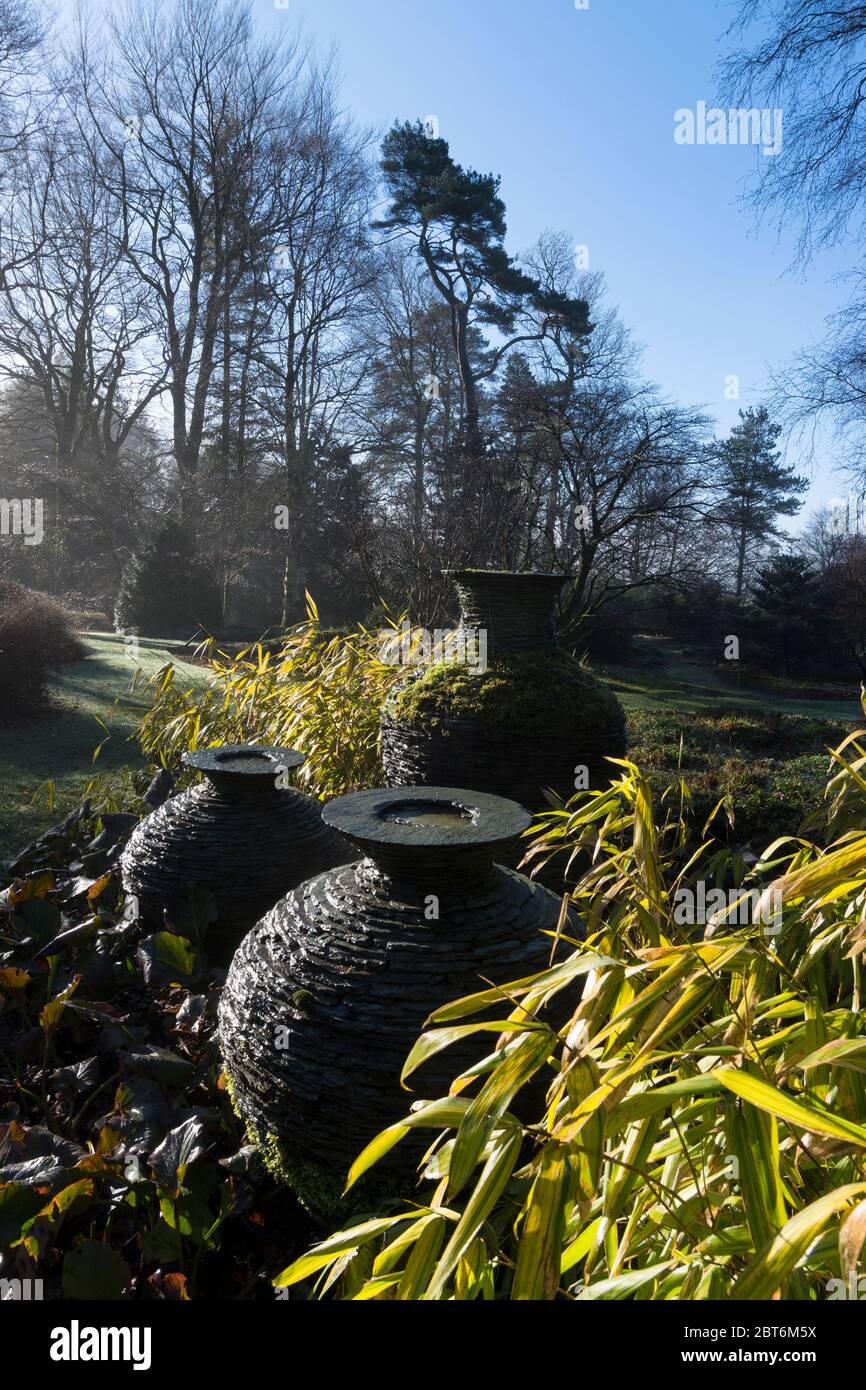 Slate urns by Joe Smith at the Japanese Garden Threave Garden, Castle Douglas Stock Photo