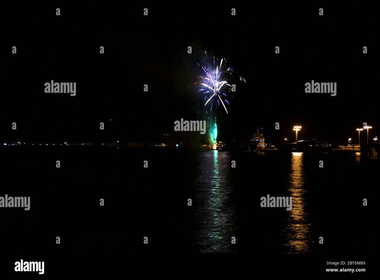 Fireworks over the sea of Argolic gulf, Nafplio. Stock Photo