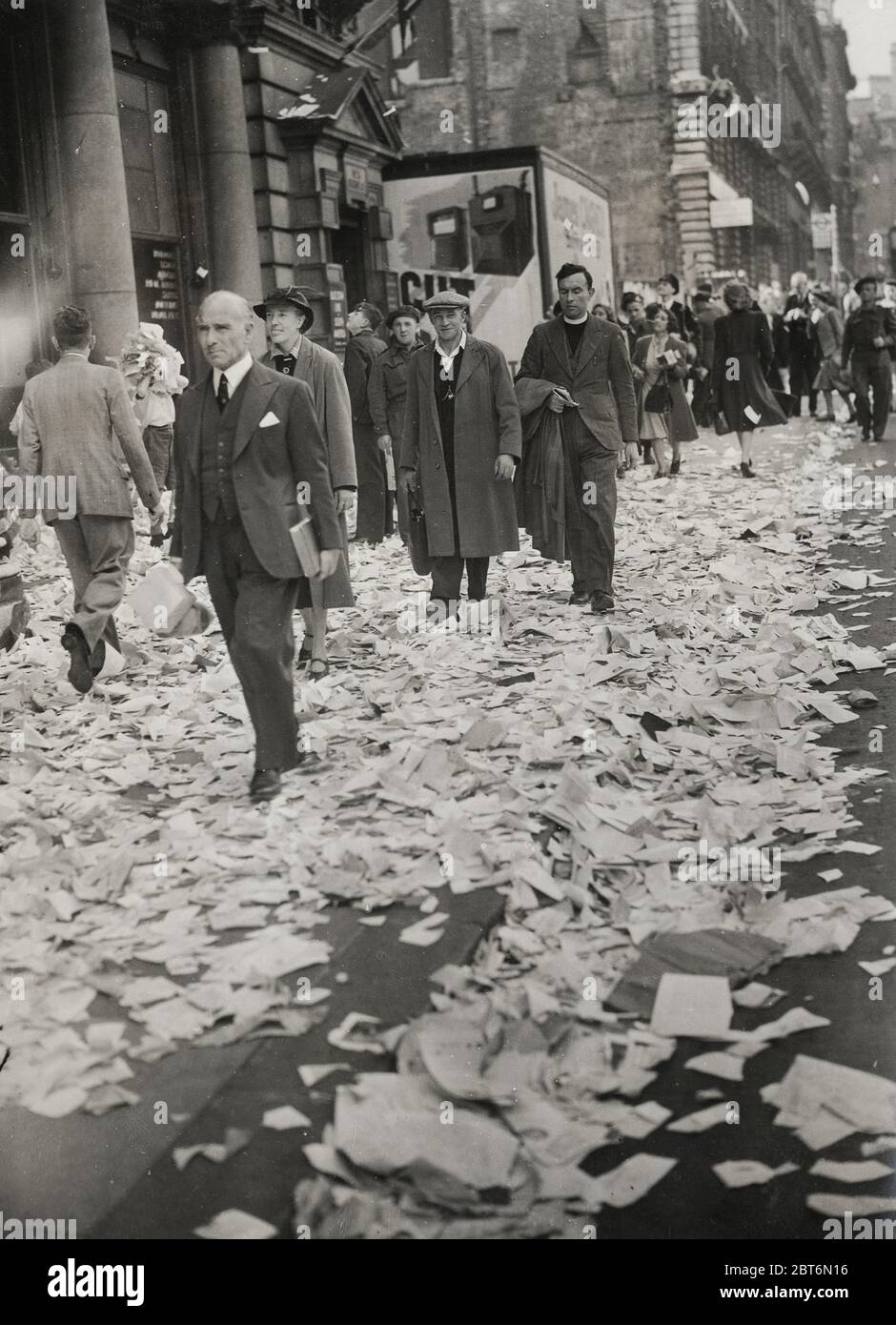 Vintage World War II photograph  - paper covering the pavements of central London following VJ Day celebrations, Japanese surrender. Stock Photo