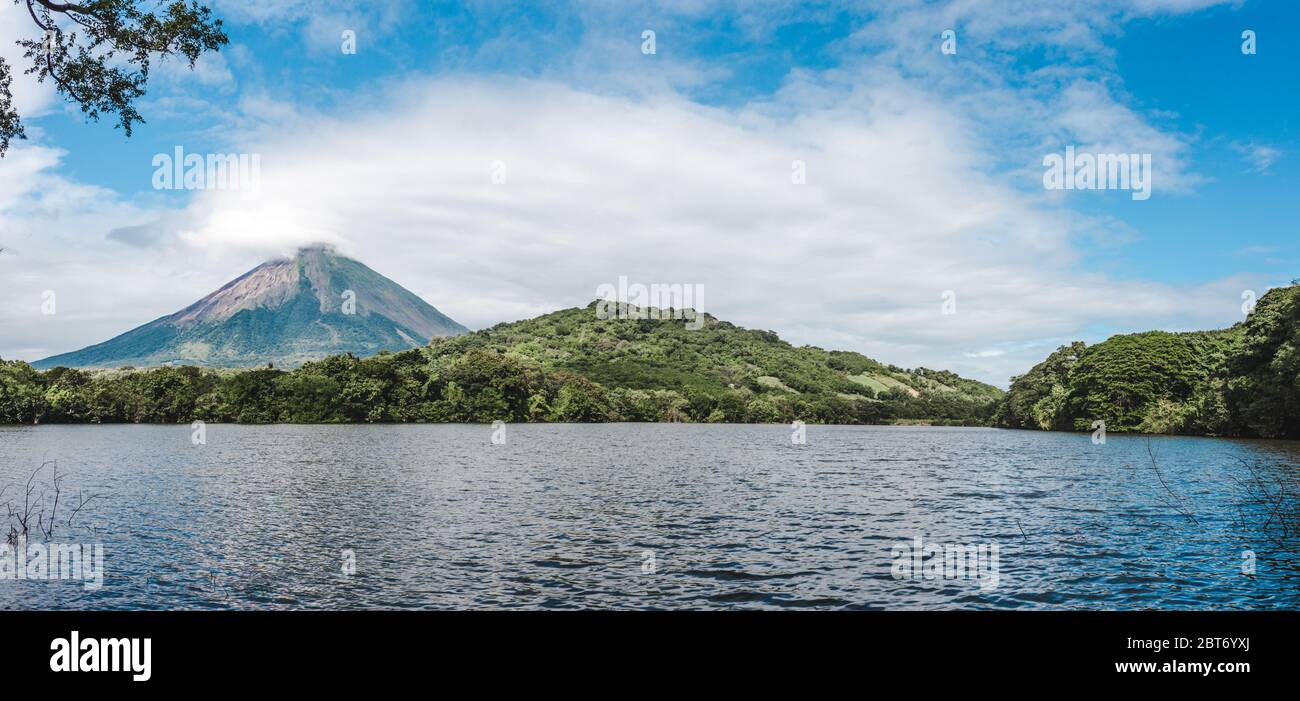 Lush greenery around Chaco Verde lake under the shadow of Volcán Maderas on Ometepe Island in Nicaragua Stock Photo