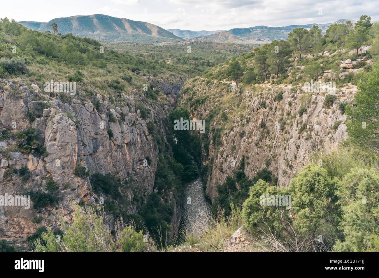 Scenic view of a canyon. Spanish hills and dramatic clouds