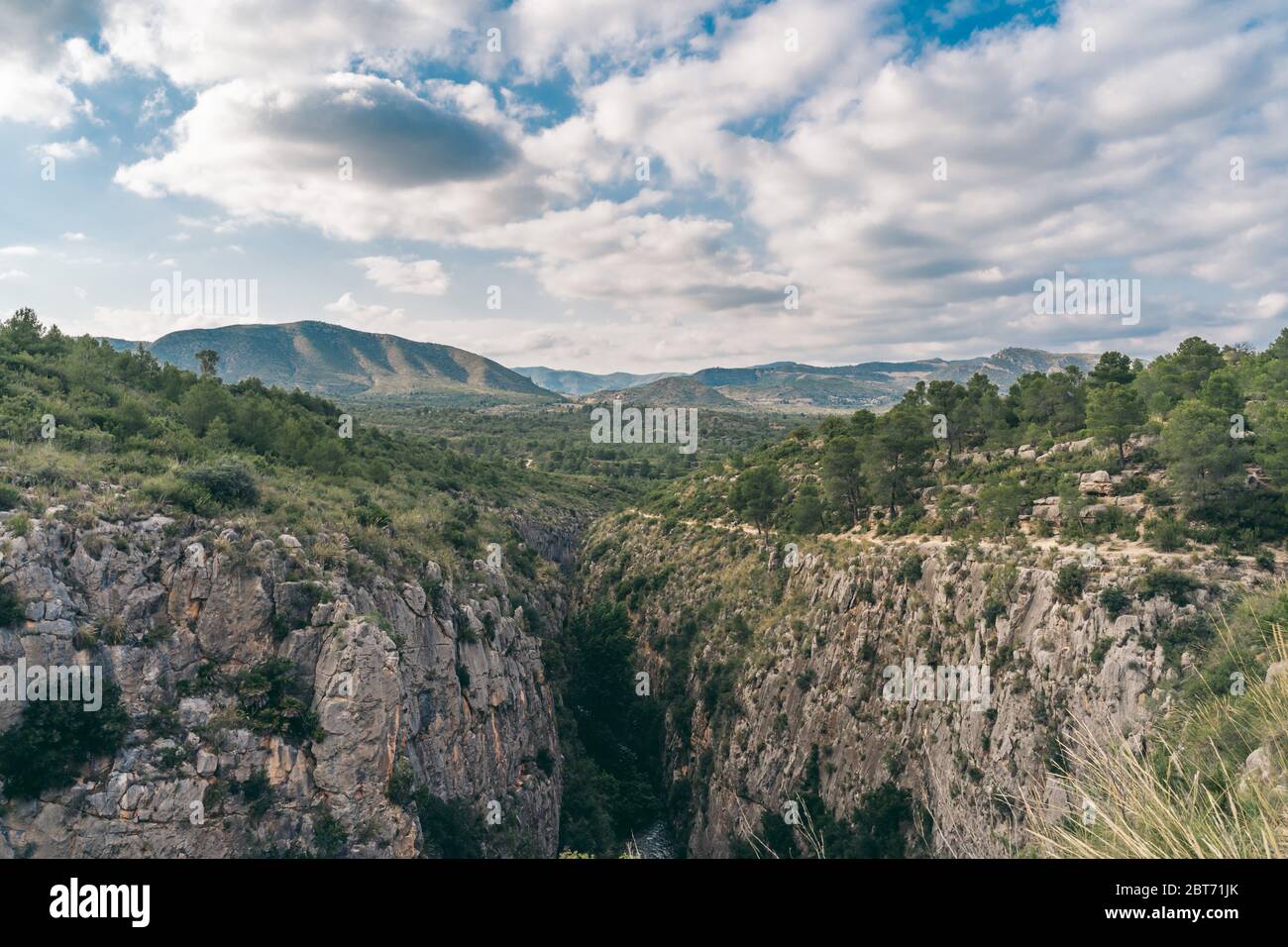 Scenic view of a canyon. Spanish hills and dramatic clouds