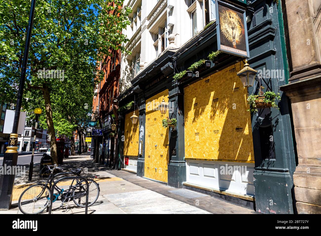 21 May 2020, London, UK - The Garrick Arms pub on Charing Cross Road closed and boarded up during the Coronavirus pandemic lockdown Stock Photo