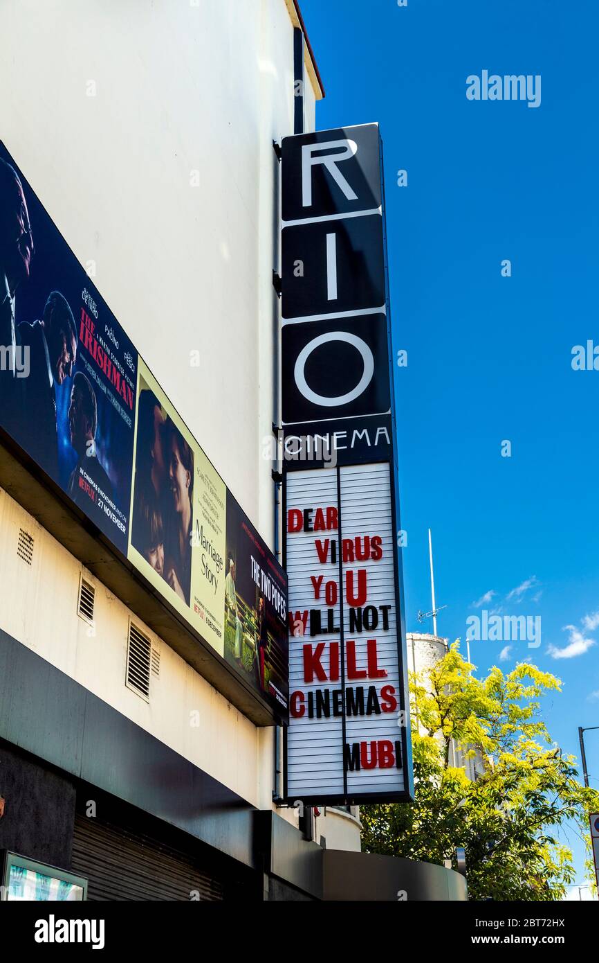 22 May 2020 London, UK - Sign on the facade of Rio Cinema, Dalston, Hackney saying 'Dear Virus You Will Not Kill Cinemas, Mubi' during the Coronavirus pandemic lockdown Stock Photo