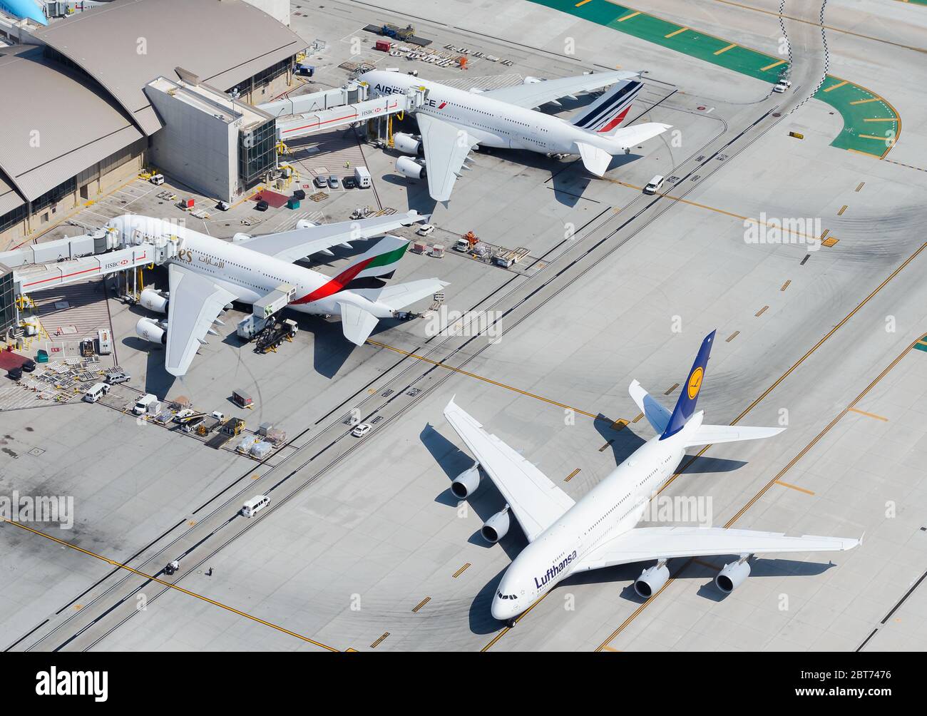Multiple Airbus A380 parked at TBIT Terminal in LAX. Biggest passenger aircraft together. Air France, Lufthansa and Emirates A380-800 super jumbo. Stock Photo