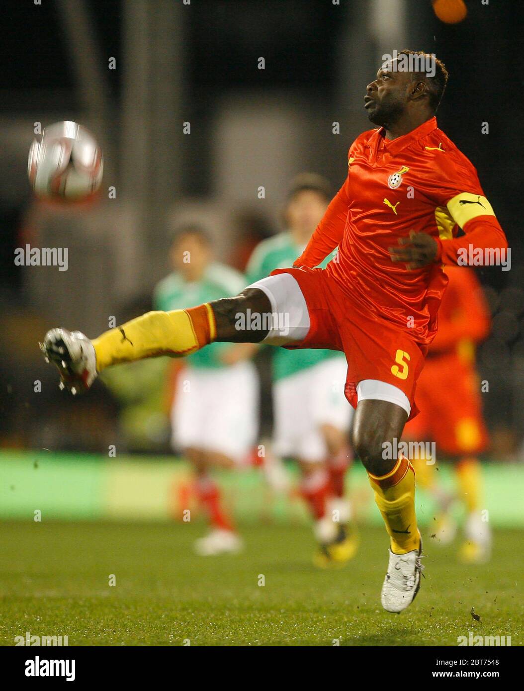 LONDON, UK. MARCH 26: Ghana's John Mensah in action during International Friendly between Mexico City and Ghana at Craven Cottage, Fulham 26 March, 20 Stock Photo