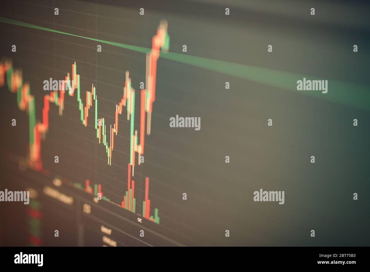 Forex chart with oscillators and indicators and Japanese candlesticks on a black background with the effect of blurring and bokeh, analysis Stock Photo