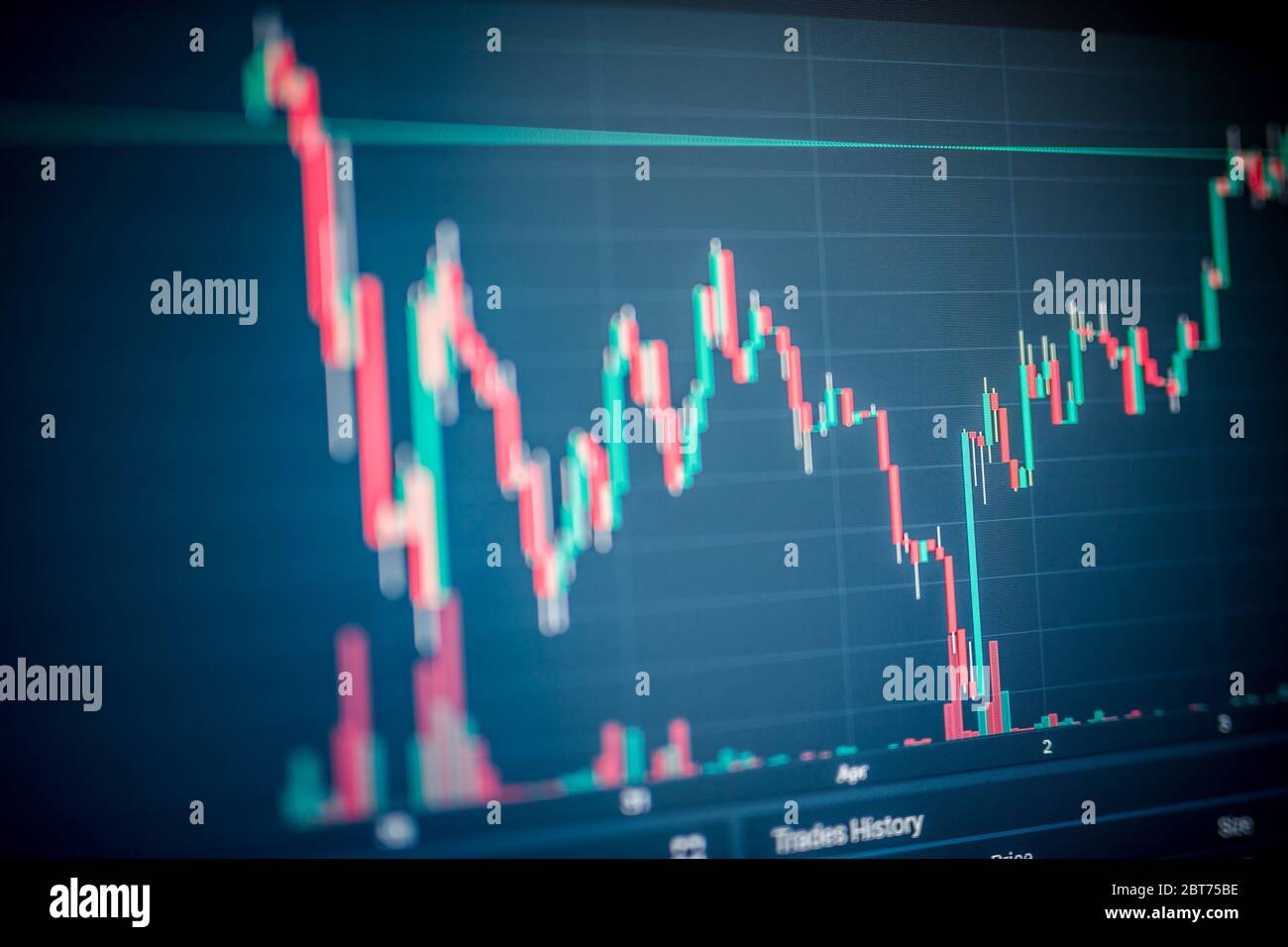 Forex chart with oscillators and indicators and Japanese candlesticks on a black background with the effect of blurring and bokeh, analysis Stock Photo