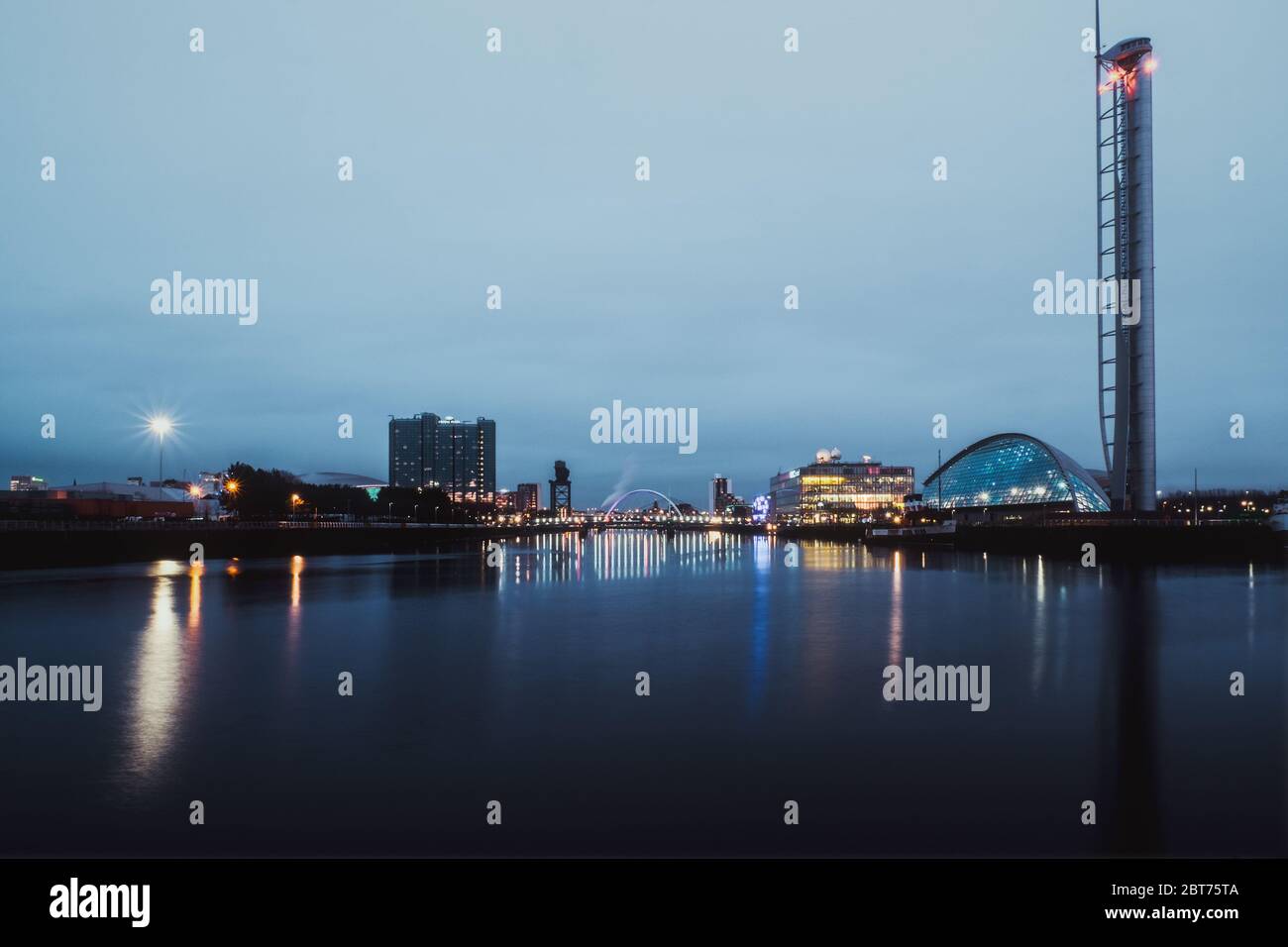 Night view of the river Clyde, Tower and Clyde Arc, Glasgow, Scotland Stock Photo