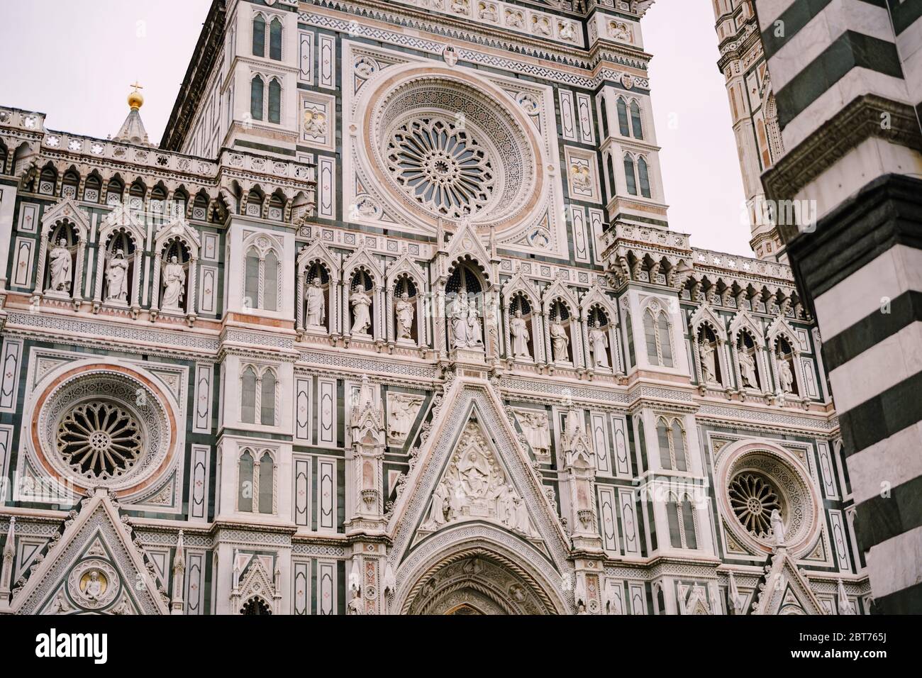 Close-up of the facade of the building of Santa Maria del Fiore in Florence, Italy. Stock Photo