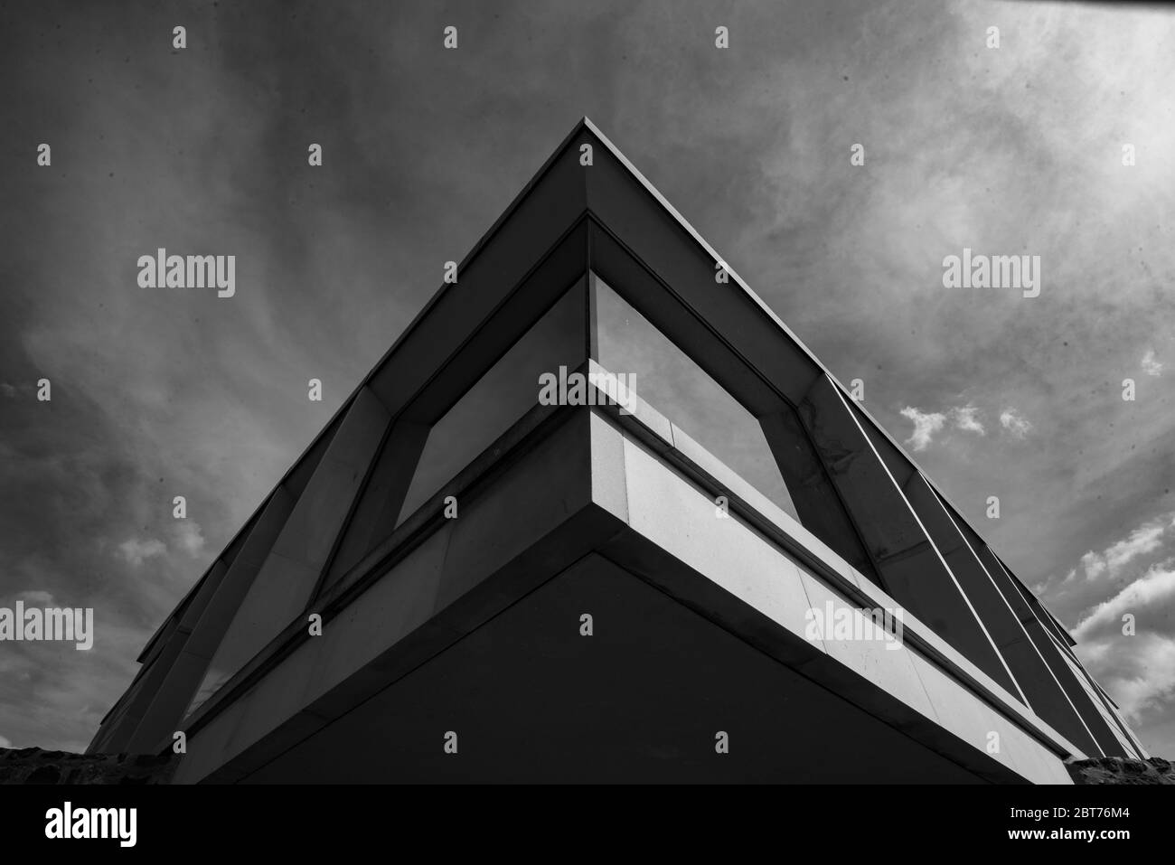 Modernist angular building on Calton Hill, Edinburgh in black and white Stock Photo
