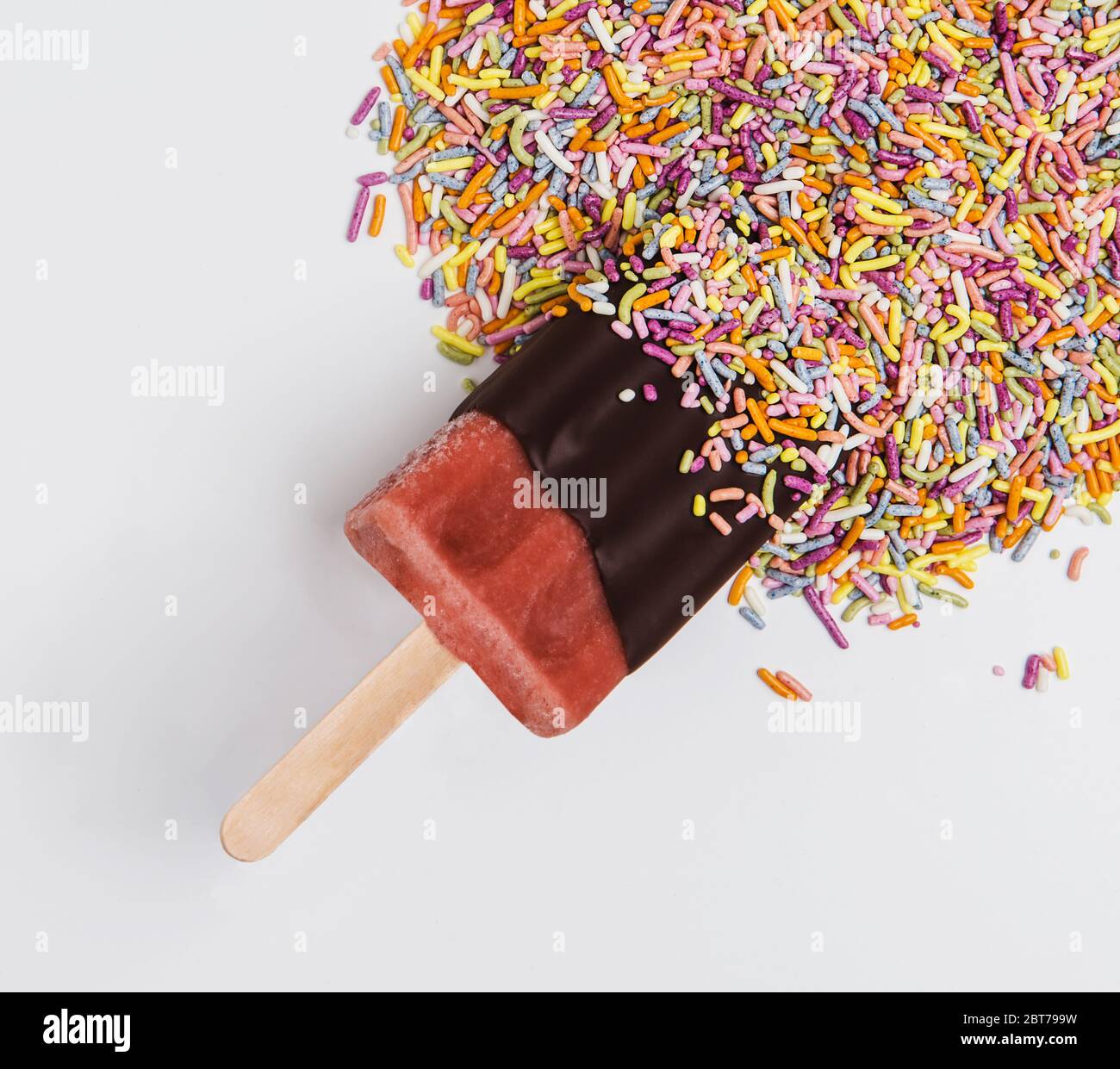 Popsicle dipped in chocolate and sprinkles Stock Photo