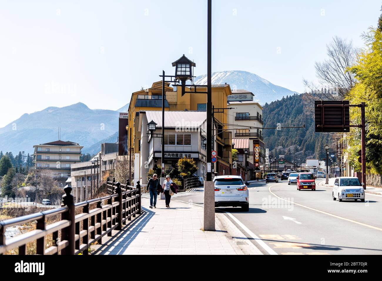 Nikko, Japan - April 5, 2019: Tochigi prefecture in Japan with street along Daiya river toward mountains by road in early spring Stock Photo