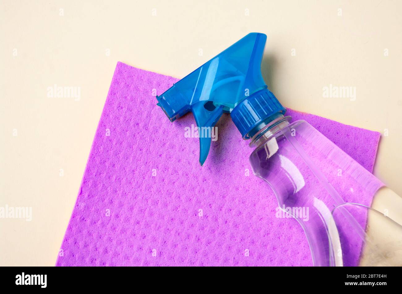 Flat lay house cleaning supplies, cleaner spray bottle,sponge