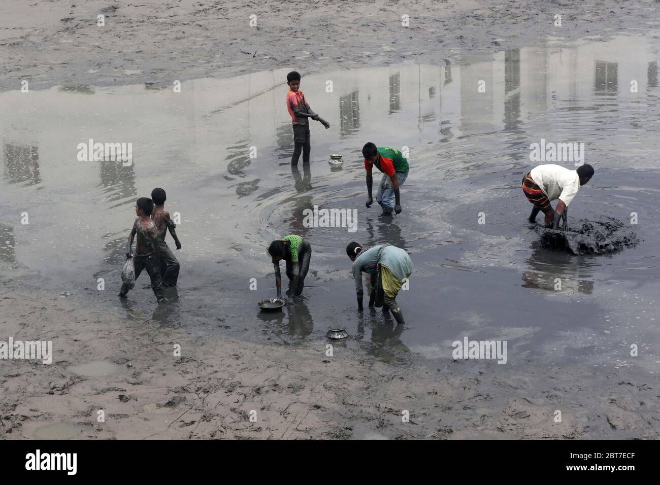 Dhaka 23 April 2015. Local people catching fish in a river at savar in Dhaka.photo by leadfoto Stock Photo