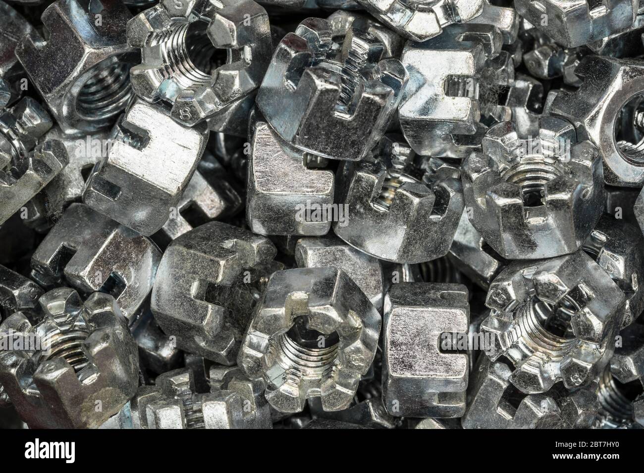 abstract background from hexagonal screw nuts Stock Photo