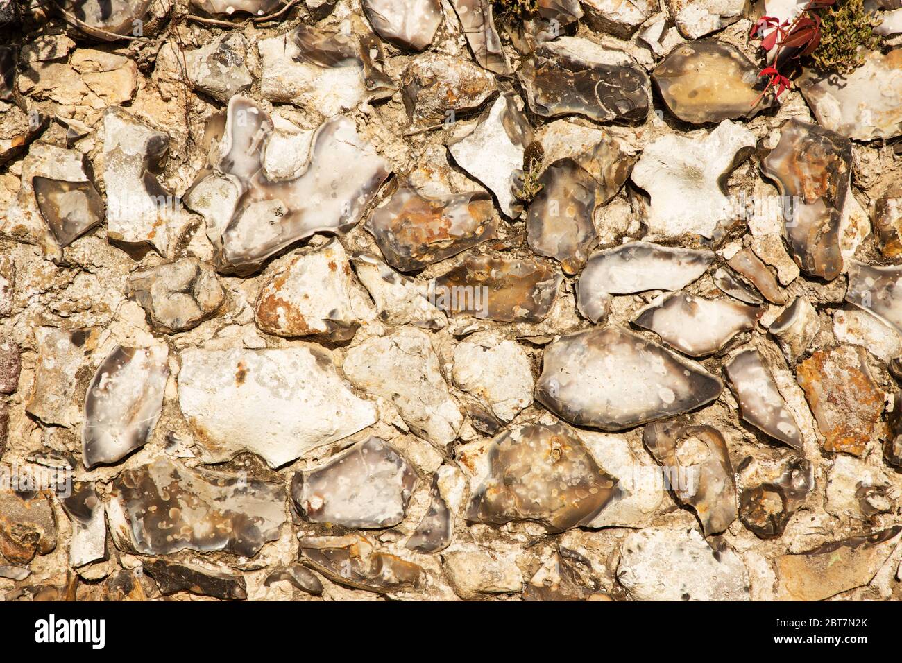 close up detail of a flint stone wall background Stock Photo