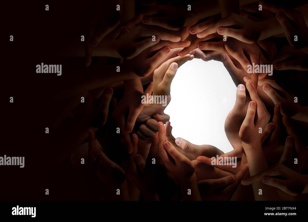 Diverse people together holding hands as a unity and partnership concept. Stock Photo