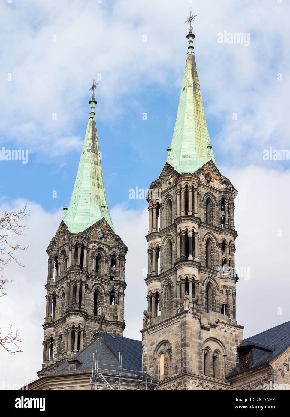 View on two steeples / towers of Bamberg cathedral (Bamberger Dom). Medieval building with characteristic green rooftop. Stock Photo