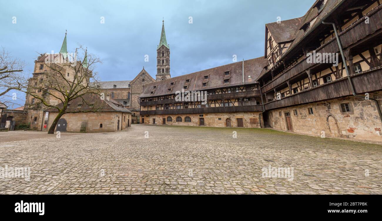 Panorama of the inner courtyard of the Alte Hofhaltung (Old Court). In the background a tower of Bamberg cathedral. An UNESCO World Heritage Site. Stock Photo