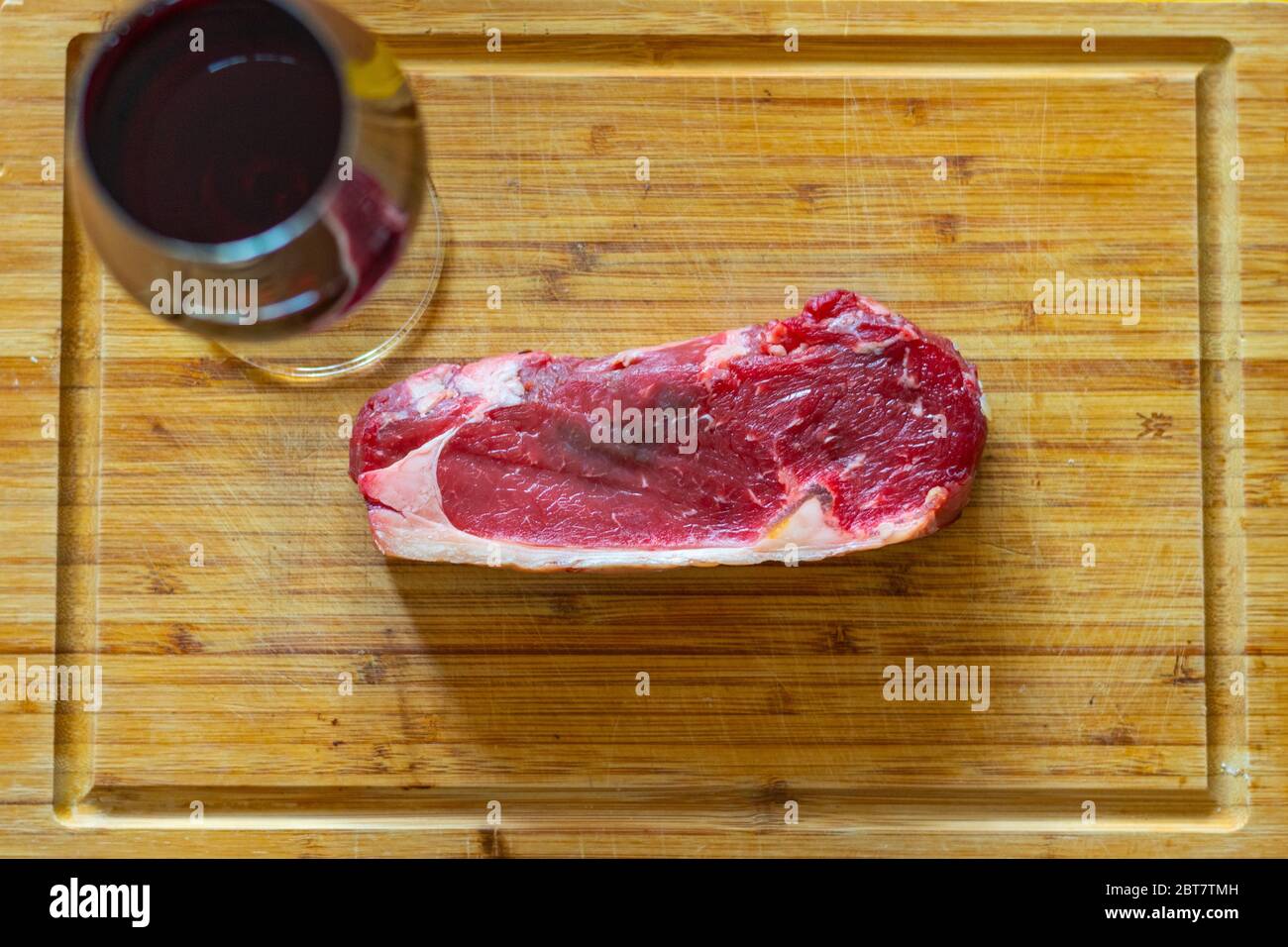 Fresh Rump Steak Shots of a sliced raw fresh rump steak with fat on the steak on a ...