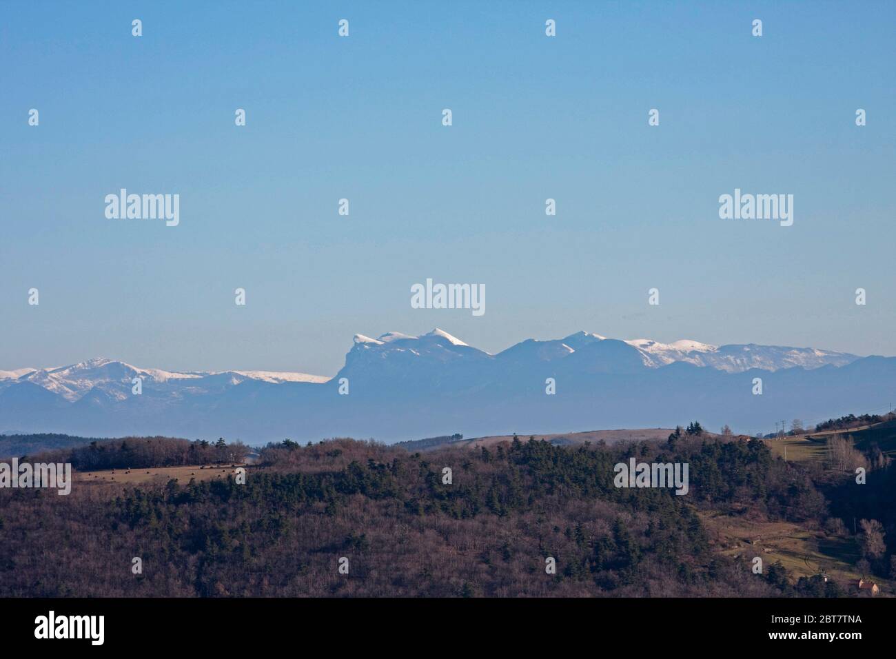 Les Trois Becs mountain range in distance, snow covered peaks, Vercors, Pre-Alpes, France Stock Photo